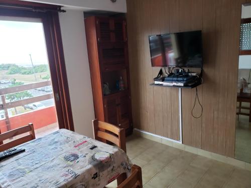 En tv och/eller ett underhållningssystem på San Bernardo Frente Al Mar