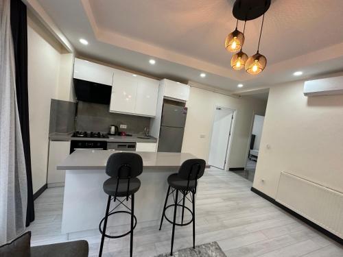 Η κουζίνα ή μικρή κουζίνα στο Rose Plus Residence