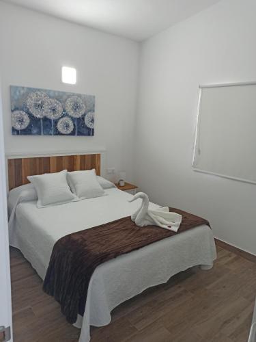 Giường trong phòng chung tại Villa la cuadra