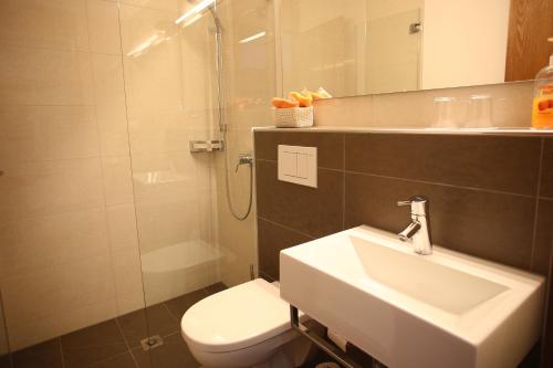 
Ein Badezimmer in der Unterkunft Hotel Garni Torkelbündte
