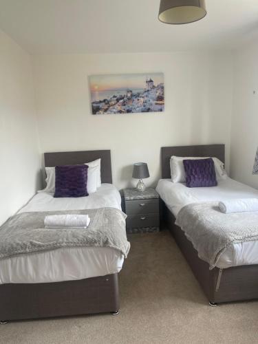 A bed or beds in a room at Steeple House