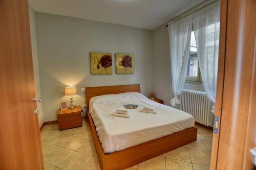 A bed or beds in a room at Varenna