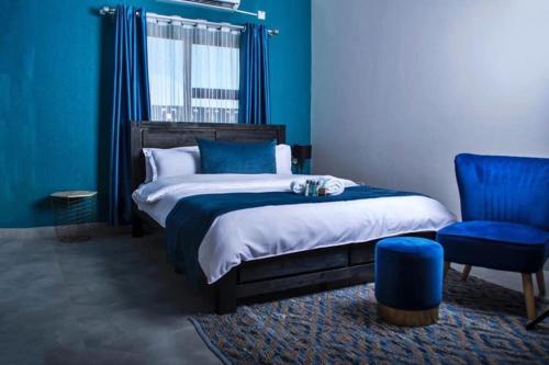 Ένα ή περισσότερα κρεβάτια σε δωμάτιο στο Ascentia BnB