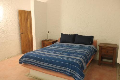 Postel nebo postele na pokoji v ubytování Rancho Campestre El Ancón