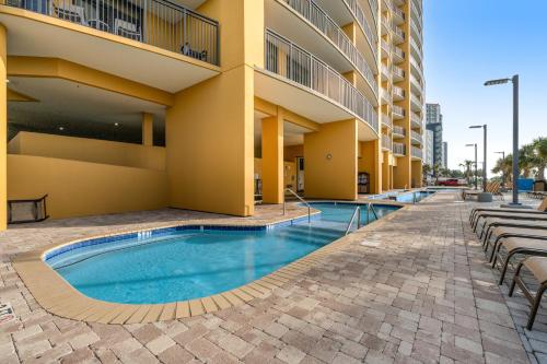 a swimming pool in the courtyard of a hotel at Anderson Ocean Club and Spa by Oceana Resorts in Myrtle Beach