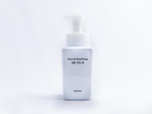 a white bottle of moisturizing moisturizing fluid next to a white bottle oficating at APA Hotel Nagasaki Dejima in Nagasaki