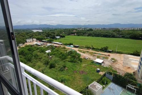 a view of a construction site from a balcony at Apto con vista panoramica al nevado del ruiz y del tolima in Ricaurte