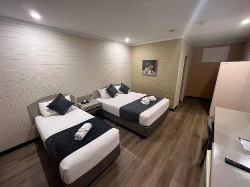 Katil atau katil-katil dalam bilik di Katherine Motel