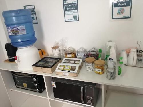 a counter with a blender and other items on it at Residencial SOL NACIENTE in Pozo Almonte