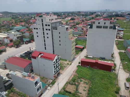 an aerial view of a city with tall buildings at Hotel Như Nguyệt in Việt Yên