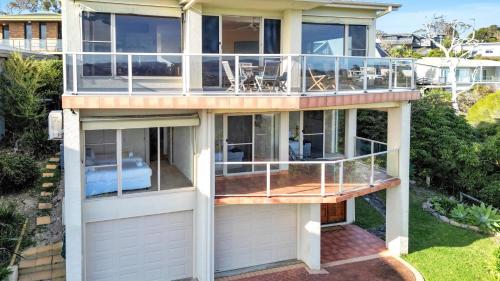 an aerial view of a house with a balcony at Sapphire Views in Merimbula