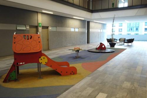 a large room with a playground in the middle of it at Departamento nuevo en Centro Cuauhtémoc in Monterrey