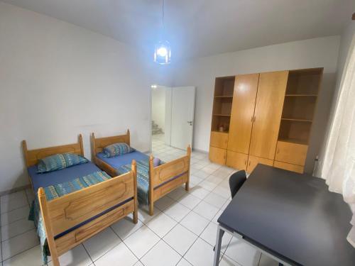 Postel nebo postele na pokoji v ubytování Tirana City Rooms - Vatra e Lagjes by Paymán Club