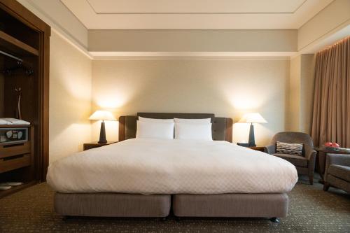 Cama o camas de una habitación en Miramar Garden Taipei