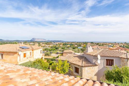 a view from the roof of a house at ISS Travel, Citai Panoramic Apartments - 1,5 km from the beach in San Teodoro