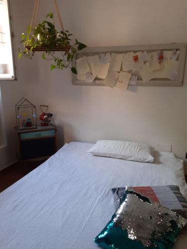 Ένα ή περισσότερα κρεβάτια σε δωμάτιο στο La casa sulla vecchia riva