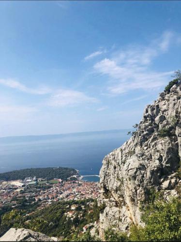 a view of a city from a rocky mountain at The best location in Makarska,free P, option bikes in Makarska