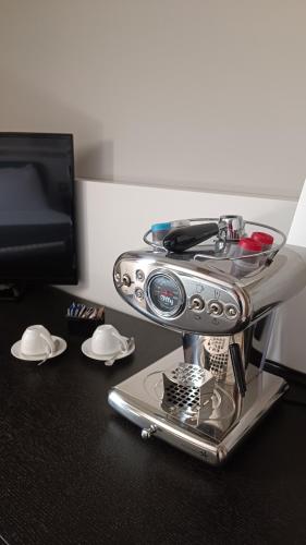 a kitchenaidaidaid mixer sitting on top of a table at Hotel Grande Italia in Chioggia