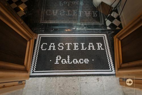 un letrero que dice el palacio de la cafetería en un suelo de baldosa en Castelar Palace & SPA by Seaward Suites en Villajoyosa