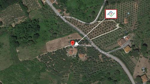 an overhead view of a house with a red roof at Il Petruccaio by TuscanyWeGo in Orceto