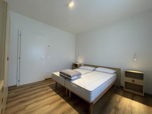 Postel nebo postele na pokoji v ubytování Casa Adamello Giustino