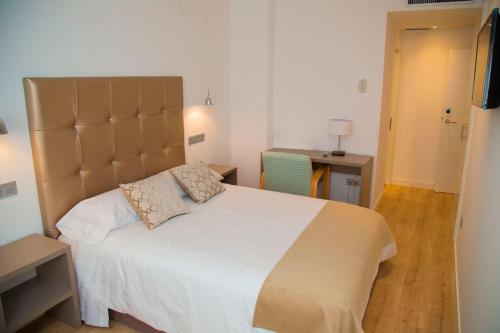 Ένα ή περισσότερα κρεβάτια σε δωμάτιο στο Hab Urban Hostel