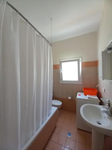 Koupelna v ubytování Kipos Apartments
