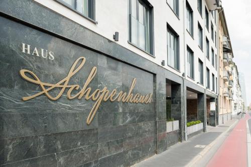 a sign on the side of a building at Hotel Schopenhauer Hof in Frankfurt/Main