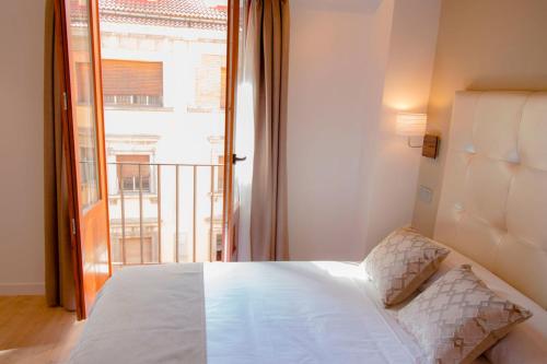 Ένα ή περισσότερα κρεβάτια σε δωμάτιο στο Hab Urban Hostel