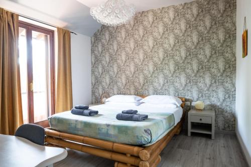 Postel nebo postele na pokoji v ubytování Villa De Alberti