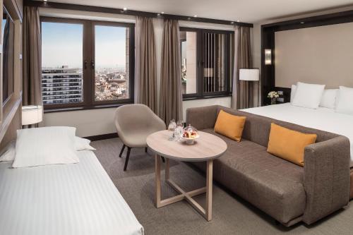 Postel nebo postele na pokoji v ubytování Melia Barcelona Sarriá