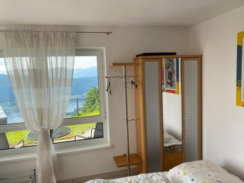 A bed or beds in a room at Paradies