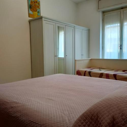 A bed or beds in a room at Anto AIRCON studio monolocale a 15 min dal centro