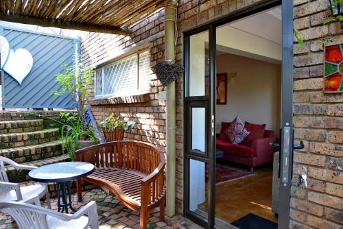 Ruang duduk di Annie's Boutique Guesthouse and Garden Spa