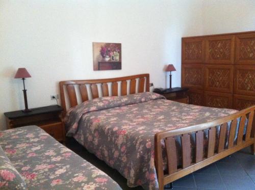 Postel nebo postele na pokoji v ubytování Hotel Pensione Moderna