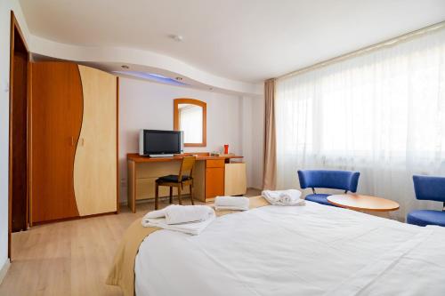 Postel nebo postele na pokoji v ubytování Complex Paloma Coral