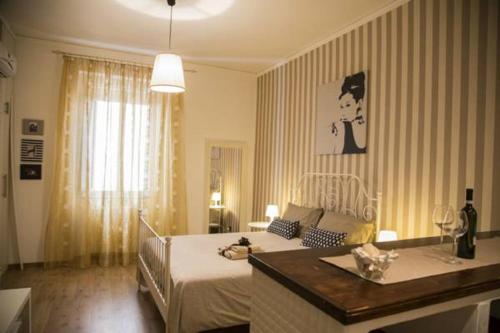 Posteľ alebo postele v izbe v ubytovaní Piazza Roma Rooms