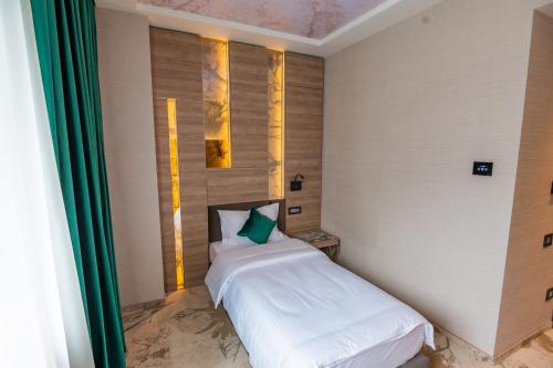 Hotel Codrişorにあるベッド