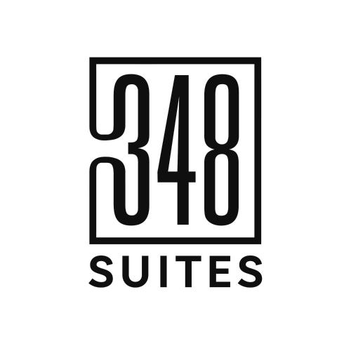 a black and white square with the number smiles at 348 Suites Short Stay in The Hague