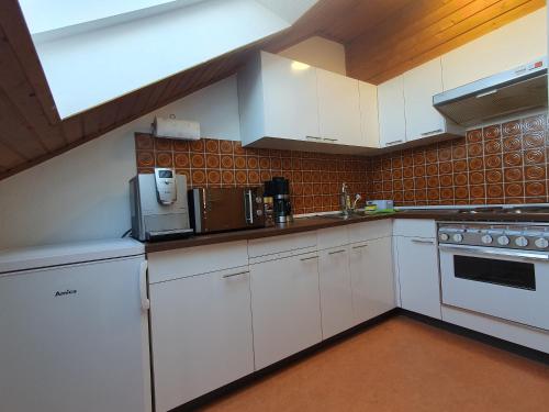 Kuchyň nebo kuchyňský kout v ubytování Wohnung mit Ausblick in Tauberbischofsheim