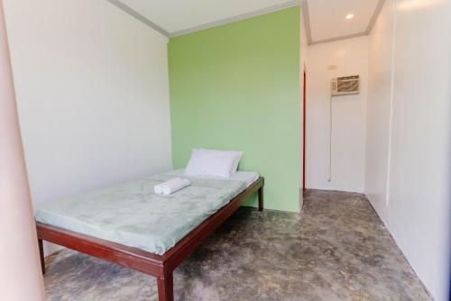 Postel nebo postele na pokoji v ubytování Kawayan Hostel