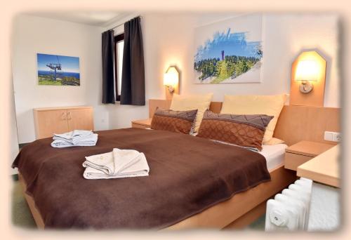 Ένα ή περισσότερα κρεβάτια σε δωμάτιο στο Pension - Der Berghof