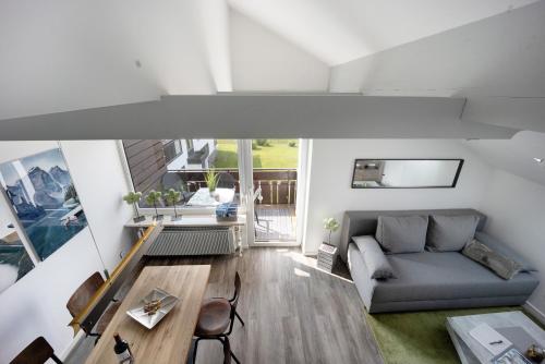Χώρος καθιστικού στο Loft mit Seeblick und Innenpool