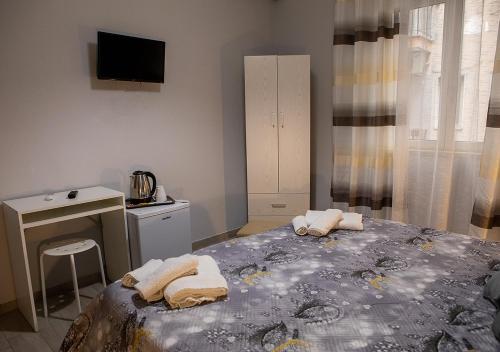Cama o camas de una habitación en zuroli suite
