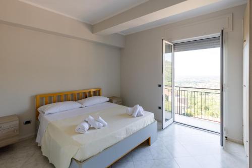 Ένα ή περισσότερα κρεβάτια σε δωμάτιο στο Elements Holiday