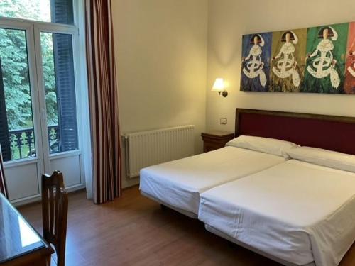 Postel nebo postele na pokoji v ubytování Balneario de Cestona