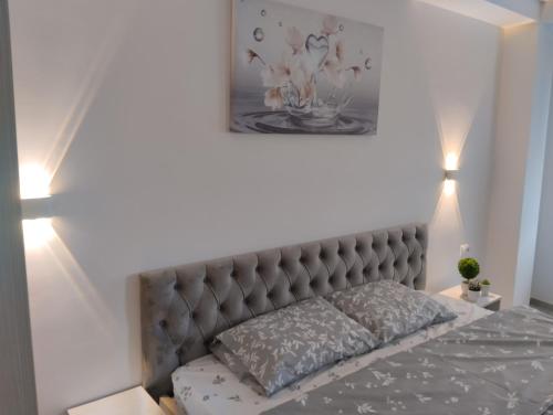 Llit o llits en una habitació de Bibi apartments