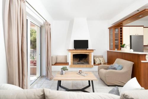 TV a/nebo společenská místnost v ubytování Omnia Maisonette by A&D Properties