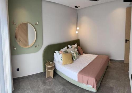 Säng eller sängar i ett rum på Maarif appartement moderne