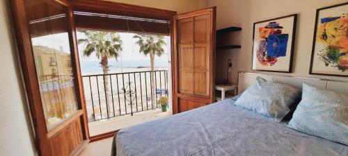 Postel nebo postele na pokoji v ubytování AR2A, Apartamento primera línea Arsenal 22